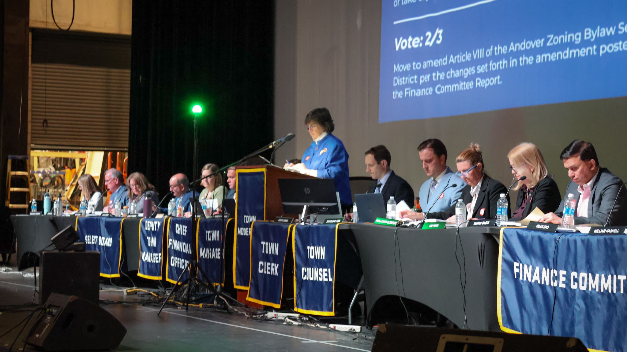 Town Officials on stage during Andover's 2025 Annual Town Meeting